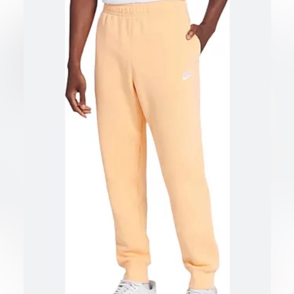 Nike standard fit taper leg regular length joggers peach orange white